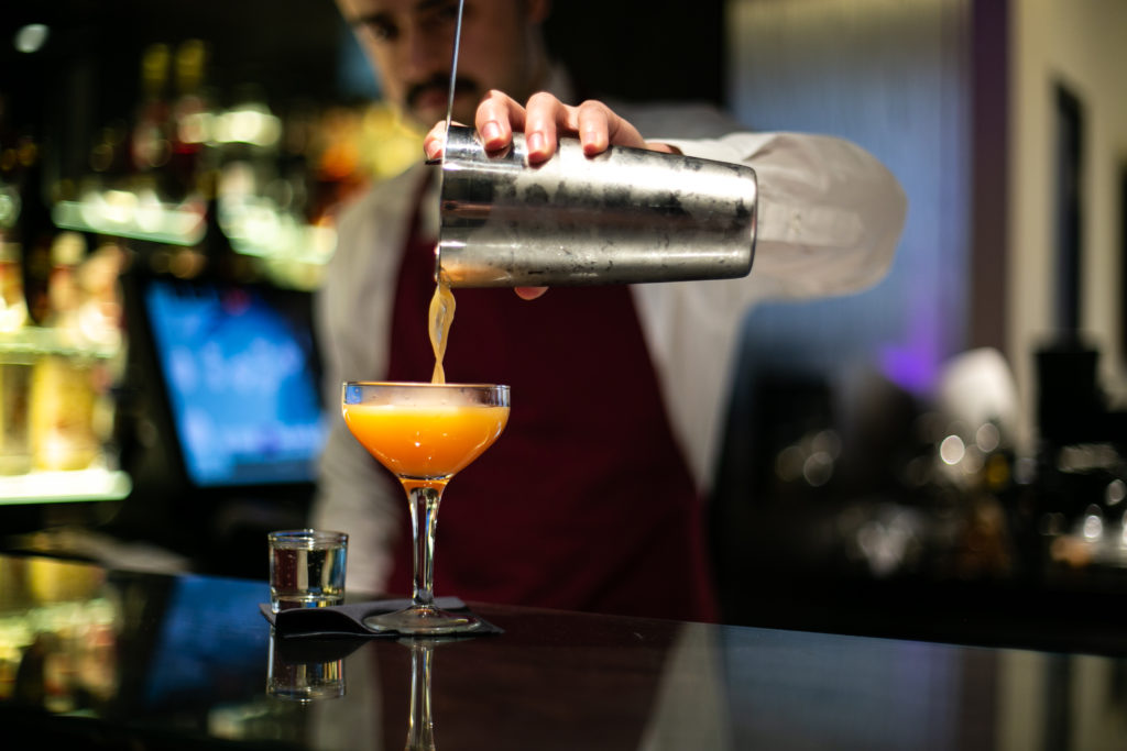 Barman making a cocktail
